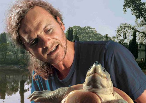 Dr. Peter Praschag holding a Batagur turtle