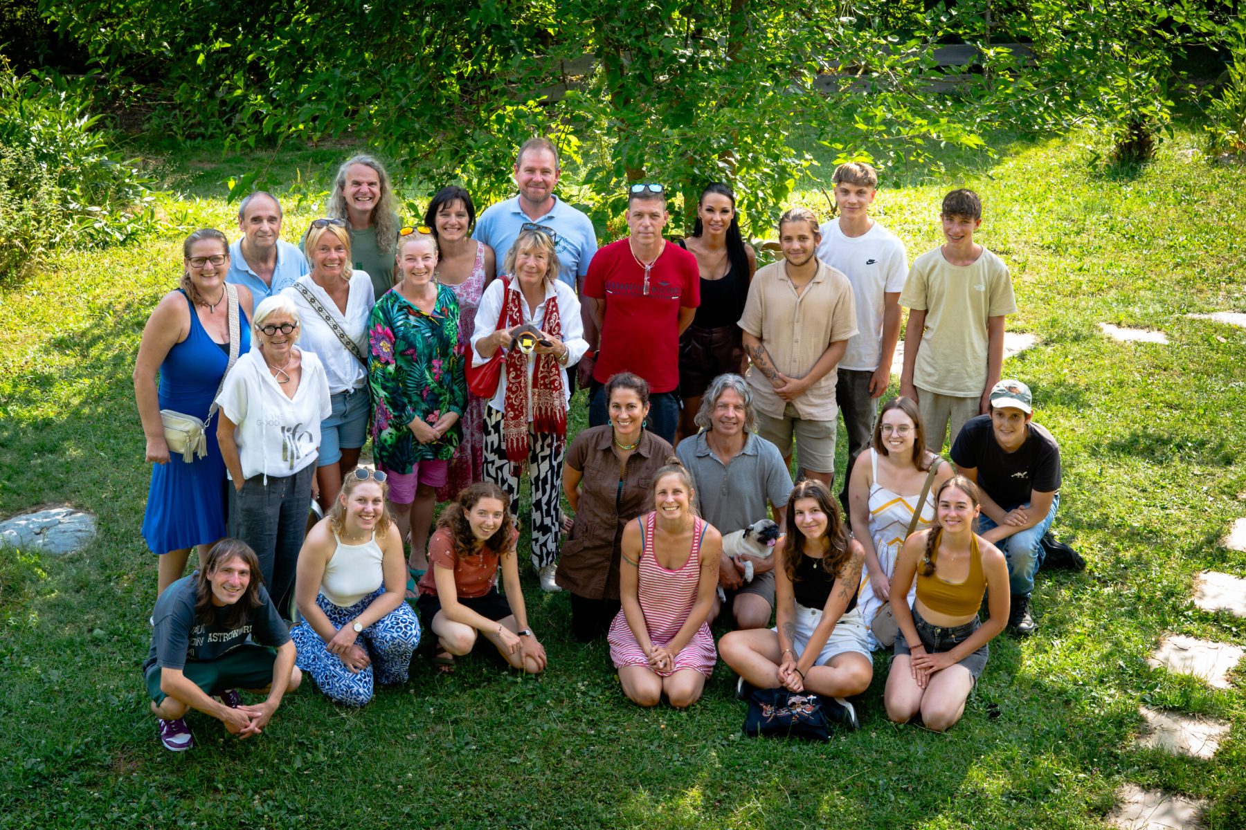 The Turtle Island team gathered outdoors, July 2025